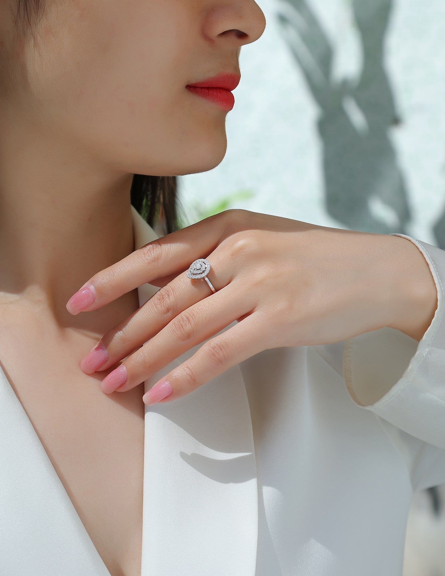 The "Celestial Tear" Two-Tiered Moissanite Ring