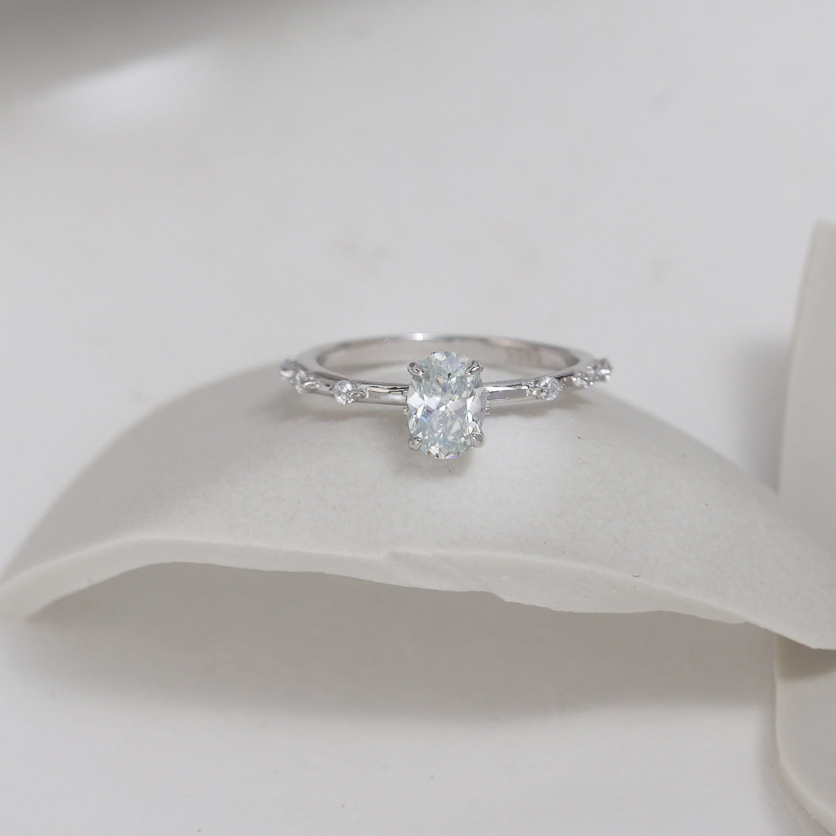 The "Luminous Oval" Minimalist Moissanite Band