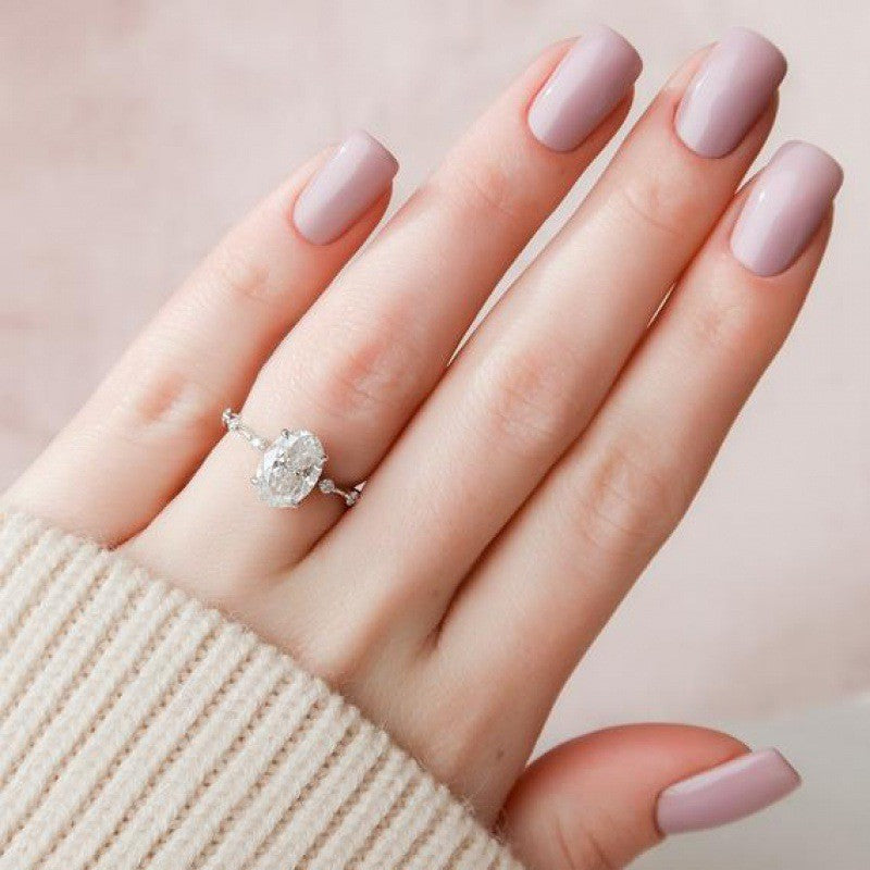 The "Luminous Oval" Minimalist Moissanite Band