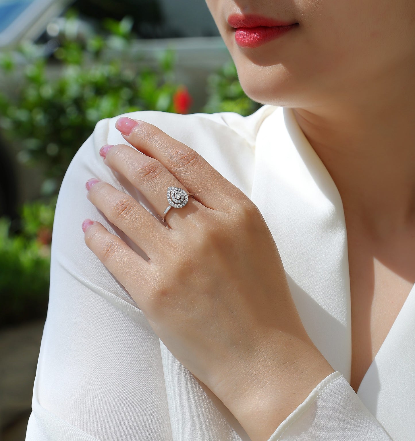The "Celestial Tear" Two-Tiered Moissanite Ring