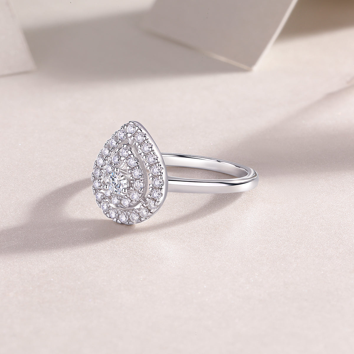 The "Celestial Tear" Two-Tiered Moissanite Ring