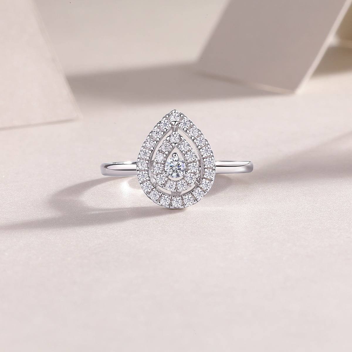 The "Celestial Tear" Two-Tiered Moissanite Ring